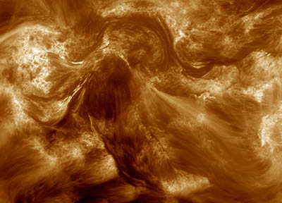Detailní snímek části sluneční koróny.